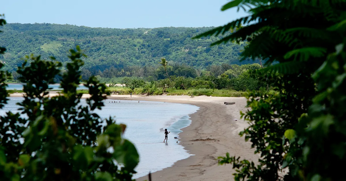 Beach and forested hills on Efate, Vanuatu